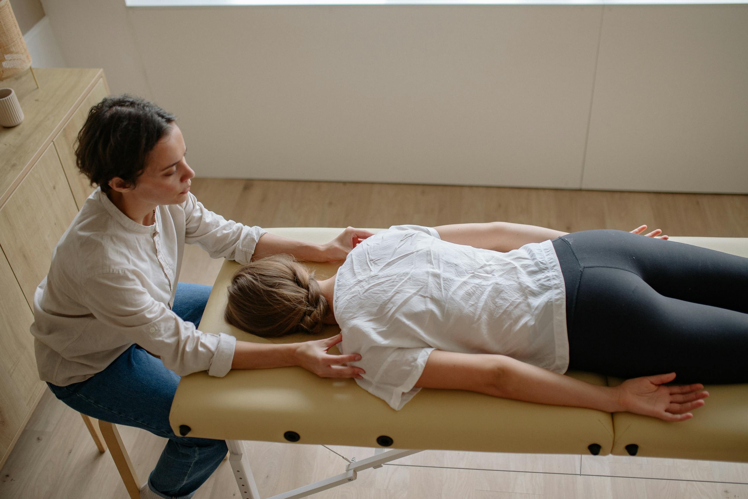 Chiropractor doing an physical rehablitation